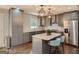 Modern kitchen features a granite island with bar stools and stainless steel appliances at 2739 Flagstone Se Dr, Atlanta, GA 30316