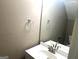 Bathroom featuring a white sink and a large mirror above it at 6300 Creekford Ln, Lithonia, GA 30058