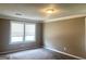 Bedroom with carpet, and a window bringing in natural light at 6300 Creekford Ln, Lithonia, GA 30058