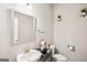 Bathroom with a decorative vanity, mirror, and neutral color scheme at 5662 Valley Loop, Fairburn, GA 30213