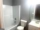 Full bathroom featuring a tub/shower combination, white toilet, and vanity with neutral countertop at 6650 Smoke Ridge, Atlanta, GA 30349