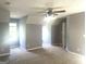 Spacious bedroom with vaulted ceilings, a ceiling fan, and neutral carpeting at 6650 Smoke Ridge, Atlanta, GA 30349