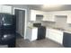 Well-equipped kitchen featuring modern appliances, ample cabinet space, and laminate countertops at 6650 Smoke Ridge, Atlanta, GA 30349