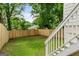 Backyard featuring a new wooden fence and stairs leading to the second level at 995 Lena Nw St, Atlanta, GA 30314