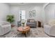 Bright living room with hardwood floors, modern furniture, and an open layout perfect for entertaining at 995 Lena Nw St, Atlanta, GA 30314