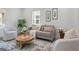 Bright living room with hardwood floors, modern furniture, and an open layout perfect for entertaining at 995 Lena Nw St, Atlanta, GA 30314