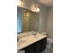 Bathroom featuring double sinks, a large mirror, and modern fixtures at 3810 Equity, Powder Springs, GA 30127