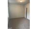 Bright bedroom featuring neutral carpet, fresh paint, a window, and a closet for a serene retreat at 3810 Equity, Powder Springs, GA 30127