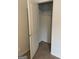 Carpeted closet with a white wire rack offering organized storage space at 3810 Equity, Powder Springs, GA 30127