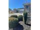 The Enclave at Powder Springs sign is surrounded by meticulously maintained landscaping for a welcoming entrance at 3810 Equity, Powder Springs, GA 30127