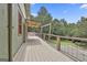 Spacious back deck with metal cable railing, perfect for outdoor relaxation and entertaining at 6220 Petersburg Rd, Fairburn, GA 30213