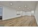 Finished basement boasts wood-look floors, recessed lights, and wet bar at 6220 Petersburg Rd, Fairburn, GA 30213