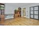Bedroom boasts wood flooring, natural light, and built-in storage at 6220 Petersburg Rd, Fairburn, GA 30213