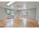 Light-filled bonus room with skylights and hardwood floors, ideal for flexible living at 6220 Petersburg Rd, Fairburn, GA 30213