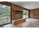 A fireplace is constructed with brick and stone at 6220 Petersburg Rd, Fairburn, GA 30213