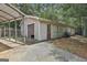 This property includes a spacious garage with a carport attached at 6220 Petersburg Rd, Fairburn, GA 30213