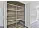 A walk-in pantry features shelving and a storage space at 6220 Petersburg Rd, Fairburn, GA 30213