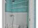 Functional utility sink area with shelving, perfect for laundry and cleaning tasks at 6220 Petersburg Rd, Fairburn, GA 30213