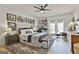 Large bedroom features natural light, ceiling fan, wood floors and stylish decor at 375 Darren Dr, Fayetteville, GA 30215