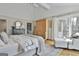 Bedroom with french doors leading to private balcony with outdoor sitting area at 375 Darren Dr, Fayetteville, GA 30215