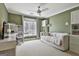 Inviting bedroom with a window, neutral walls, and a trundle daybed at 375 Darren Dr, Fayetteville, GA 30215
