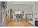 Sunlit dining area with hardwood floors and elegant furniture setting at 375 Darren Dr, Fayetteville, GA 30215