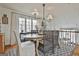 Charming dining room with wood table, seating for six, and natural light, ideal for hosting gatherings at 375 Darren Dr, Fayetteville, GA 30215
