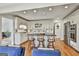 Gourmet kitchen featuring custom cabinetry, an island with seating, and stainless steel appliances at 375 Darren Dr, Fayetteville, GA 30215