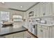 Kitchen featuring marble countertops, stainless steel appliances, and custom cabinetry at 375 Darren Dr, Fayetteville, GA 30215
