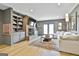 Stylish living room features built-in shelving, a brick fireplace, and a comfortable white sofa at 375 Darren Dr, Fayetteville, GA 30215