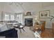 Bright living room boasts vaulted ceilings, fireplace, and a neutral palette creating an inviting and airy atmosphere at 375 Darren Dr, Fayetteville, GA 30215