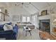 Spacious living room features fireplace, vaulted ceiling, and ample seating for relaxation and entertaining at 375 Darren Dr, Fayetteville, GA 30215