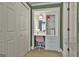 Charming office nook with white desk, pastel walls, and a storage cabinet at 375 Darren Dr, Fayetteville, GA 30215