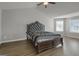 Spacious bedroom with vaulted ceiling, hardwood floors, and natural light at 2004 Brittlebank Ln, Lawrenceville, GA 30043
