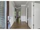 Inviting foyer with hardwood floors, paneled walls, and views into the living spaces, highlighting the home's layout at 2004 Brittlebank Ln, Lawrenceville, GA 30043