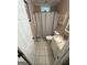 Well-kept bathroom featuring a tiled floor and vanity with a sink and toilet at 2119 Amherst Se Trl, Conyers, GA 30094