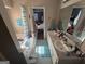 Bright bathroom with double sinks, a tub, and a tiled floor for a luxurious feel at 2119 Amherst Se Trl, Conyers, GA 30094