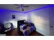 This bedroom features a ceiling fan and accent lighting at 2119 Amherst Se Trl, Conyers, GA 30094