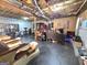 Large basement area with exposed ceiling, various exercise equipment, and potential for customization at 165 Cedar Ridge Rd, Locust Grove, GA 30248