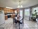 Functional eat-in kitchen offering ample cabinet space, modern appliances, and a dining area for everyday living at 165 Cedar Ridge Rd, Locust Grove, GA 30248