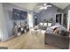Well-lit living room with vaulted ceilings, cozy seating, and stylish decor, creating a relaxing space at 165 Cedar Ridge Rd, Locust Grove, GA 30248