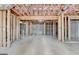 Unfinished basement with exposed wooden framing, concrete floor, and pink insulation at 4090 Sandy Lake Dr, Lithonia, GA 30038