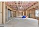 Unfinished basement ready for customization with exposed studs and concrete flooring at 4090 Sandy Lake Dr, Lithonia, GA 30038