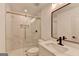 Sleek bathroom showcasing modern vanity, toilet, and a stylish, glass-enclosed shower at 4090 Sandy Lake Dr, Lithonia, GA 30038