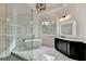 Bright bathroom featuring a soaking tub, a glass-enclosed shower, and a modern vanity at 4090 Sandy Lake Dr, Lithonia, GA 30038