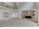 View of the open living area leading to the modern gourmet kitchen with an island at 4090 Sandy Lake Dr, Lithonia, GA 30038