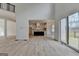 Open living area showcasing access to a gourmet kitchen and a patio at 4090 Sandy Lake Dr, Lithonia, GA 30038