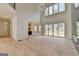 Open living area featuring a fireplace, large windows and access to the gourmet kitchen at 4090 Sandy Lake Dr, Lithonia, GA 30038