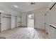 Spacious walk-in closet with custom shelving and natural light from a large window at 4090 Sandy Lake Dr, Lithonia, GA 30038