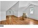Attic featuring hardwood flooring, skylights and an air conditioner at 1042 Faith Se Ave, Atlanta, GA 30316